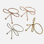 مجموعة من 4 حاملات مناديل على شكل فيونكة و4 لمسات نهائية