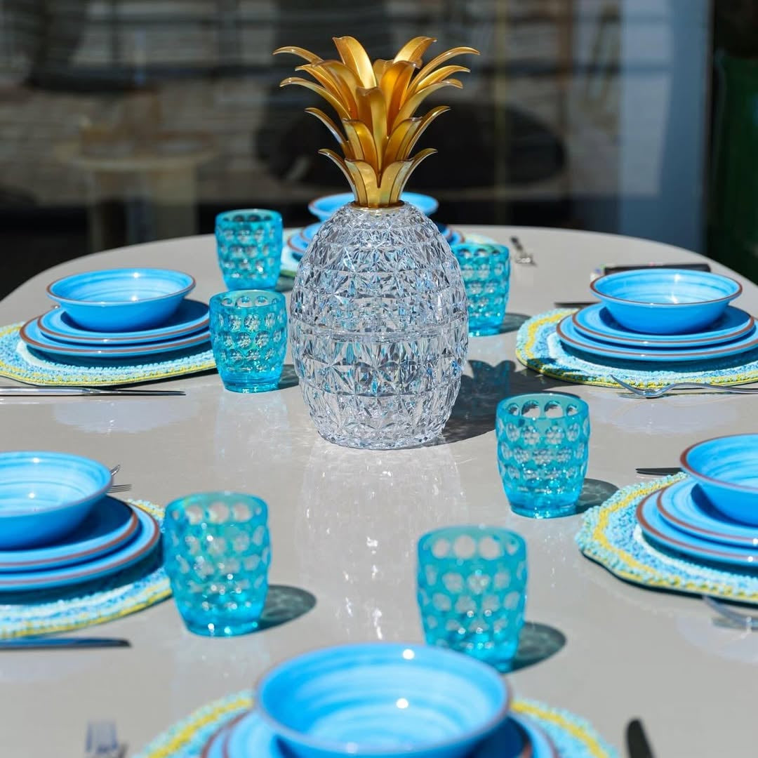 Mario Luca Giusti Lente Tumbler, Turquoise in synthetic crystal, styled in a table setting