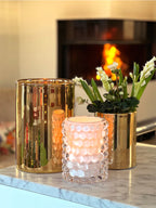 Skogsberg & Smart Gold Hurricane Lamp, Medium, styled in a room setting 2
